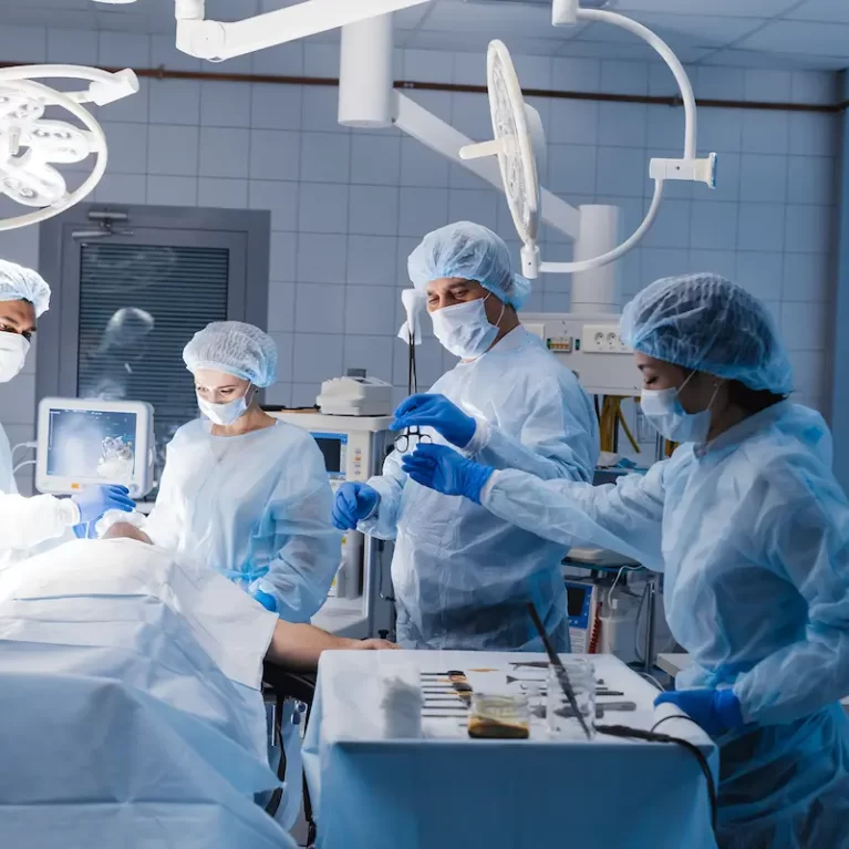 Locum tenens physician currently undergoing surgery in a operating room with the help of CRNAs