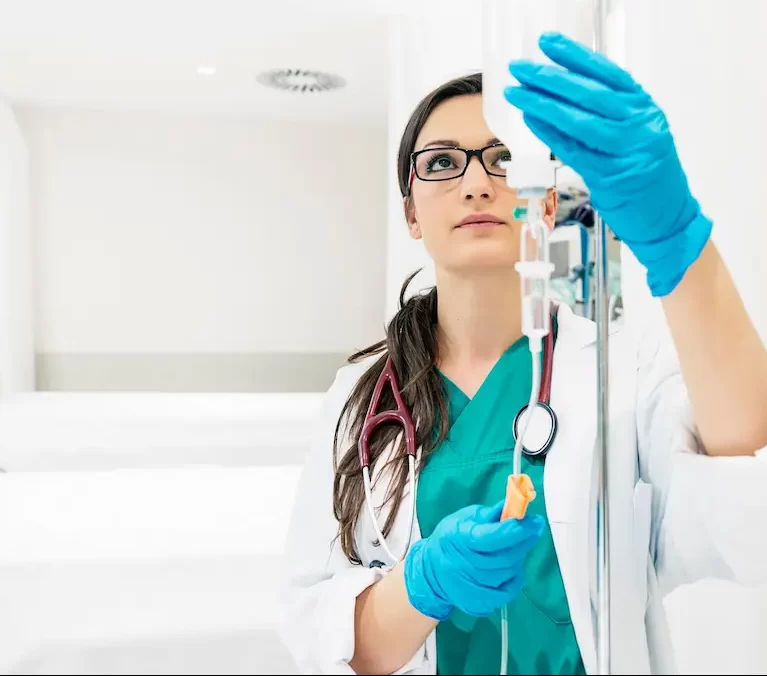 Locum CRNA setting up an IV
