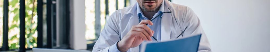 Locum tenens physician looking at a checklist for traveling